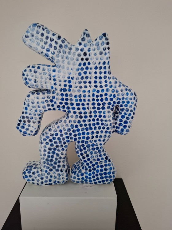 Image 1 of The iconic dog in drops