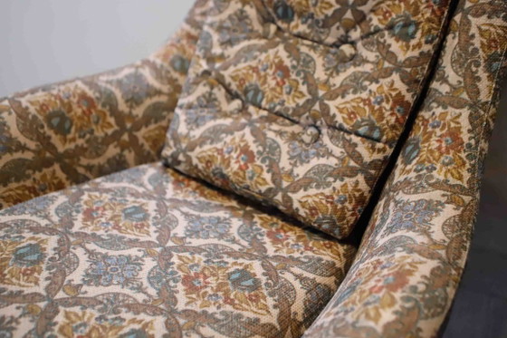 Image 1 of Set van 2 vintage draaibare fauteuils met hoge rugleuning en abstracte bekleding.