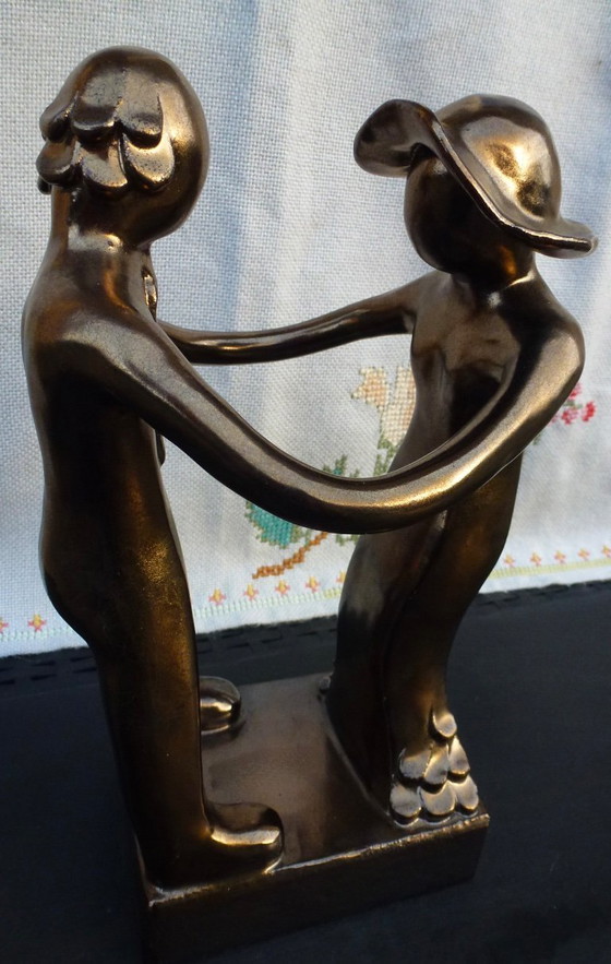 Image 1 of Coppia di sposi in ceramica, bronzata, l'Impegno.