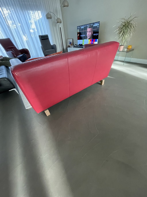 Red leather bench, brand Leolux