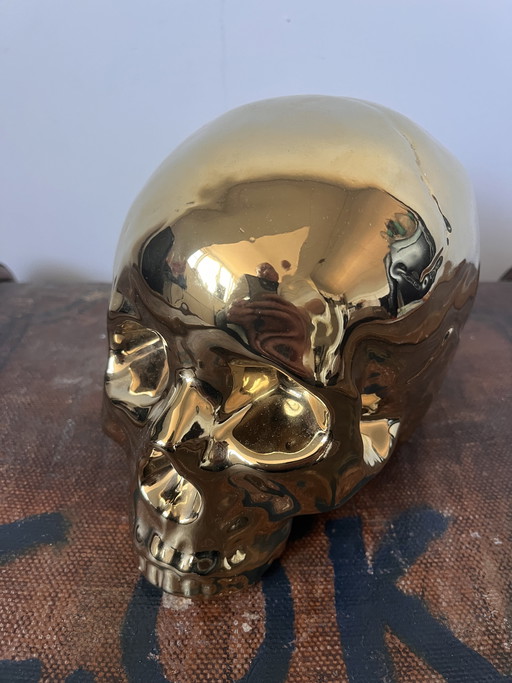 Golden skull piggy bank real life size