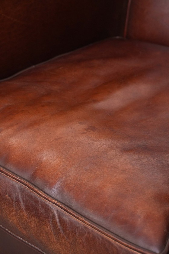 Image 1 of Vintage schapenleren clubfauteuil met siernagels