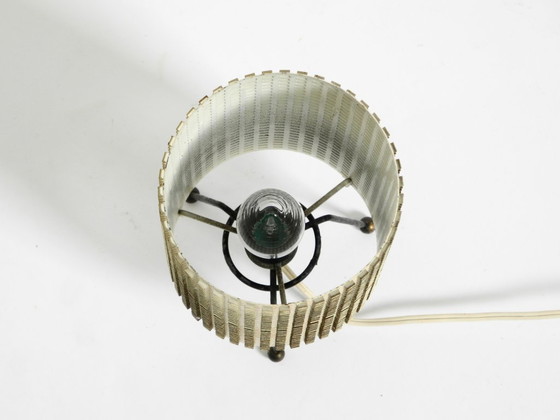 Image 1 of Original 1950s brass tripod table lamp with a perforated metal lampshade