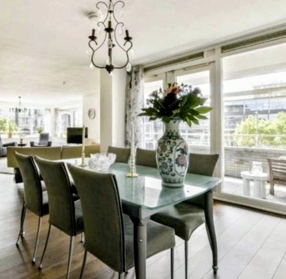 Image 1 of Mesa de comedor de cristal con 6 sillas.