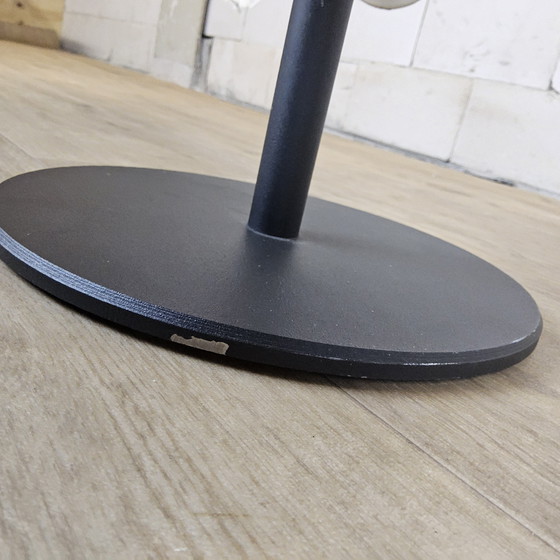 Image 1 of Modern curved metal minimalist side table with magazine rack / newspaper rack / magazine rack