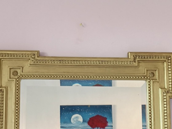 Image 1 of Large antique mirror in gilded wood and beveled glass