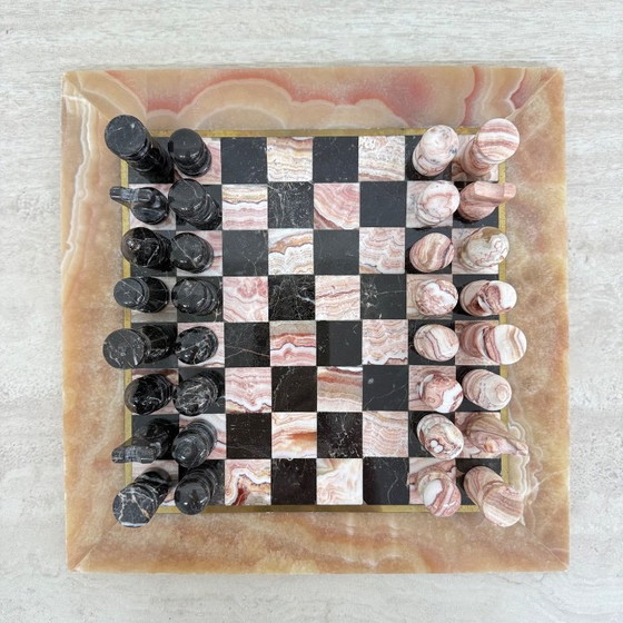 Image 1 of Scacchiera in marmo anni '70 rosa con bordo nero e rame