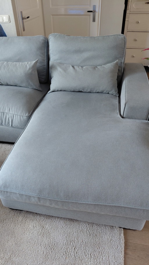 Lounge sofa with footstool
