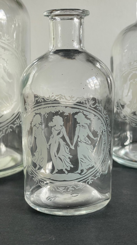 Image 1 of Vintage Engraved Glass and Wood Bottles
