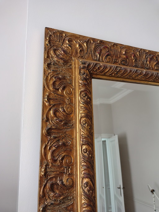 Specchio rettangolare con cornice placcata in oro in stile rococò