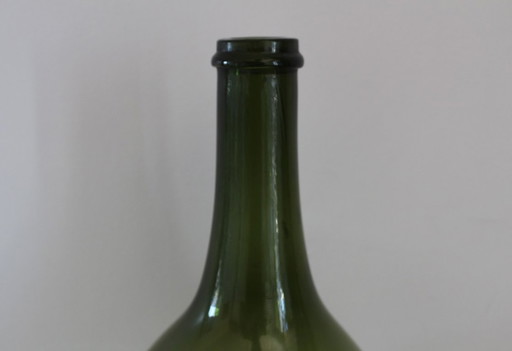 Antique magnum bottle in hand-blown glass
