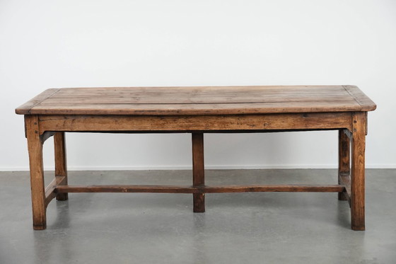 Image 1 of Robust antique French 6-person dining table made of fruit wood with 3 drawers from the late 18th century