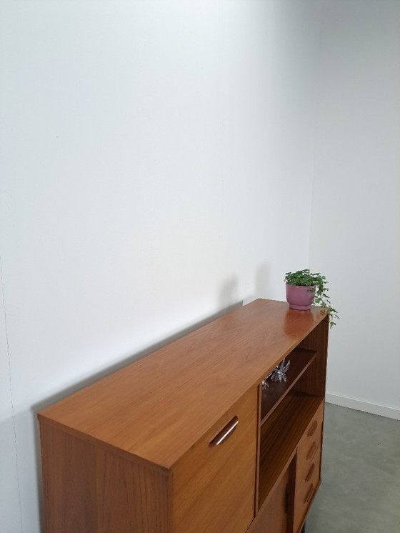 Image 1 of Armario de pared de teca con cajones, barra y patas negras