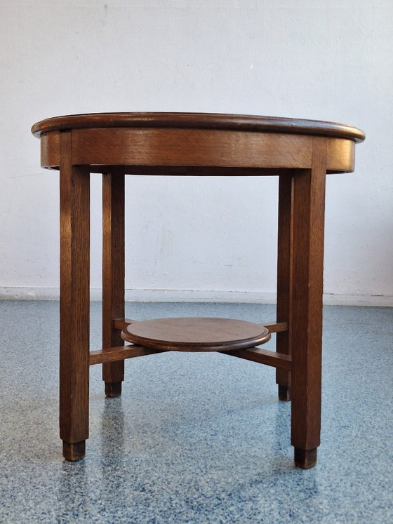 Image 1 of Conjunto de dos sillas bajas y mesa de centro de la Escuela de Ámsterdam.