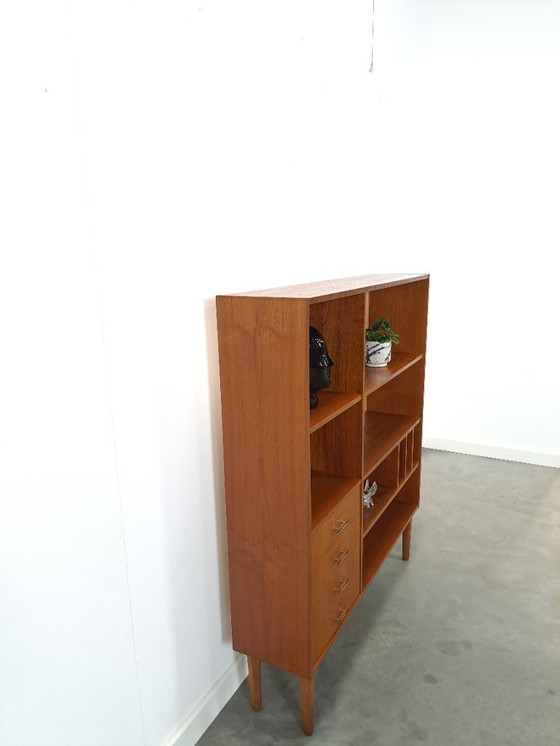 Image 1 of Deens teak vakkenkast met lades en hoge poten, vintage wandkast