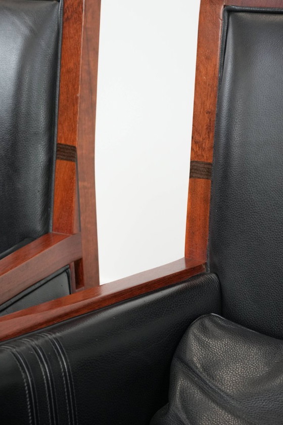 Image 1 of 2 x Black cowhide Art Deco design armchairs with high backs by Schuitema