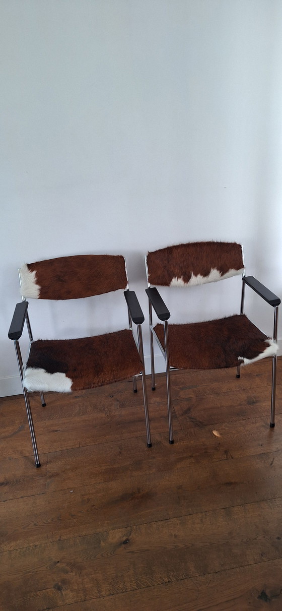 Image 1 of Two Gijs van der Sluis chairs with cowhide.