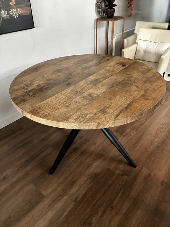 Image 1 of Round dining table with spider leg