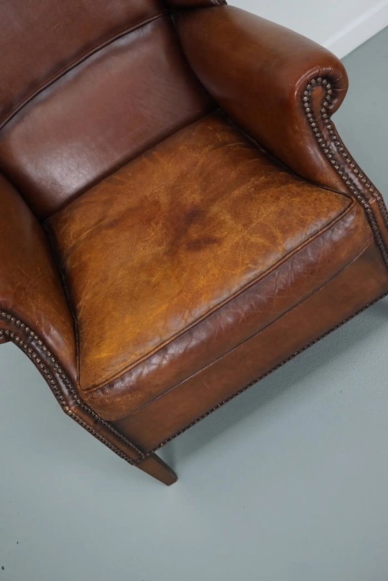 Image 1 of Vintage Nederlandse cognackleurige leren clubfauteuil