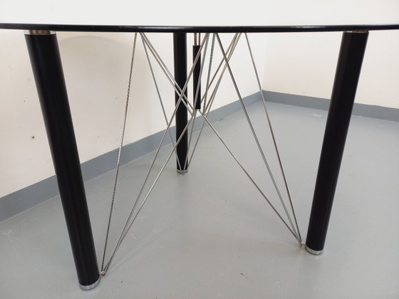 Image 1 of Vintage round dining table in smoked glass, black metal and chrome metal from the 80s