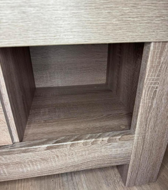 Image 1 of Table basse avec tiroir – aspect chêne