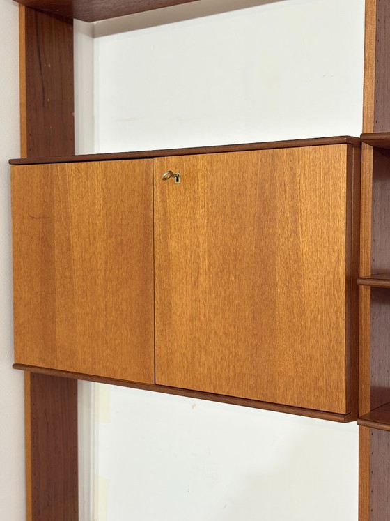 Modular mid-century wall shelf by interna-Peter Pedrides / Teak shelving system 1960s – Shelving unit, Wood (photo 4 of 27)