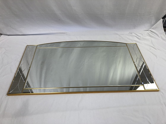 Image 1 of Large faceted mirror framed in brass