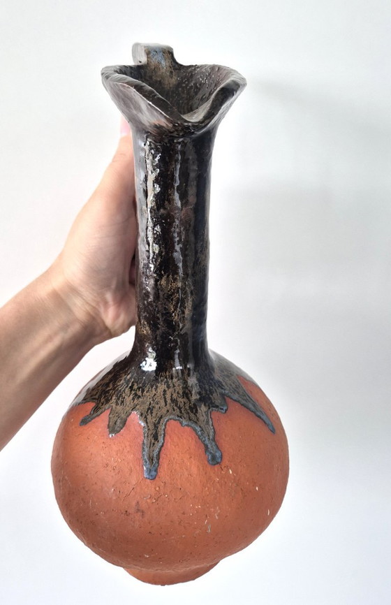 Terracotta ceramic vase with dark metallic drip glaze (photo 4 of 6)