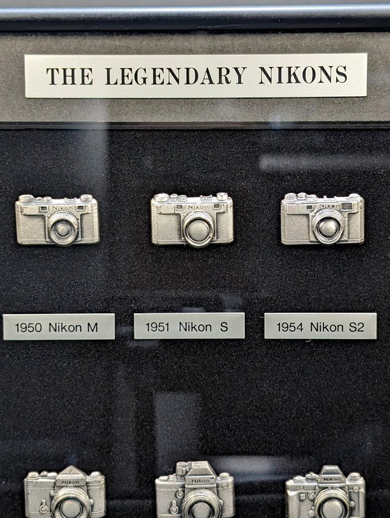 Image 1 of Vintage Nikon verzamelobjectenlijst – De legendarische Nikon camera-evolutieplaat