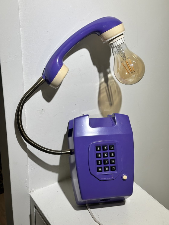 Image 1 of Vintage purple hang-up telephone