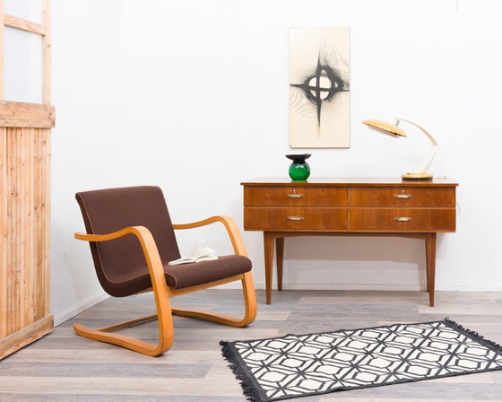 Image 1 of Dressoir/ladekast uit de jaren 50, gemaakt van walnoothout. In uitstekende originele staat.