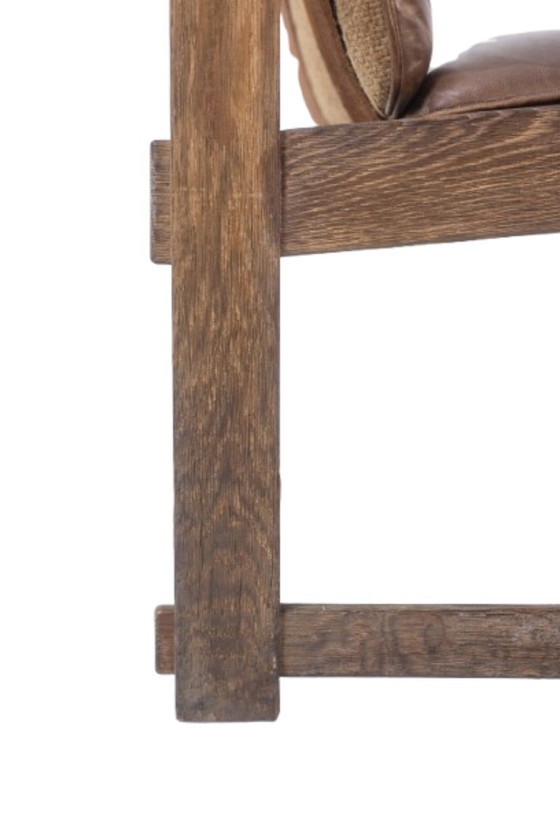 Image 1 of Paar eikenhouten loungestoelen, bekleed met leer. Gemaakt in de jaren 60.