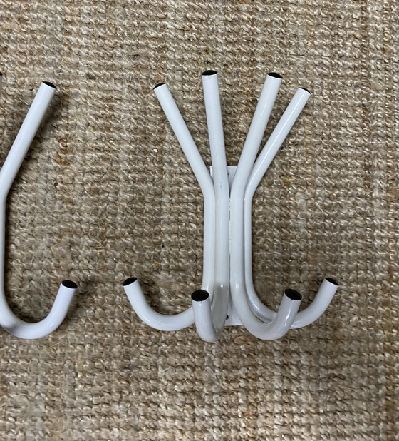 Image 1 of Two vintage heavy metal coat racks