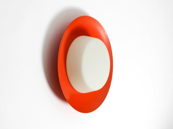 Image 1 of Grote Mid Century wand- of plafondlamp van glas met metalen reflector in rood van Kaiser Leuchten