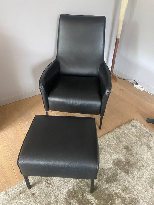 Chair with footstool