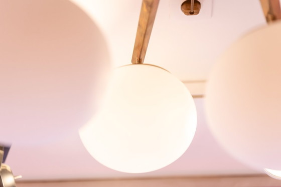 Image 1 of Angelo Lelli. Lampadario in ottone e opalino. Contemporaneo.