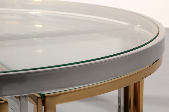 Image 1 of Table basse Maison Charles en laiton, chrome et verre Elégante des années 1970