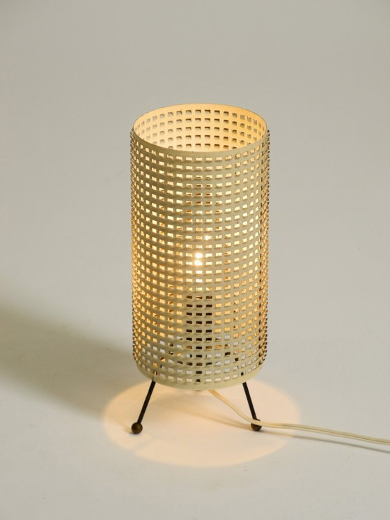 Image 1 of Original 1950s brass tripod table lamp with a perforated metal lampshade