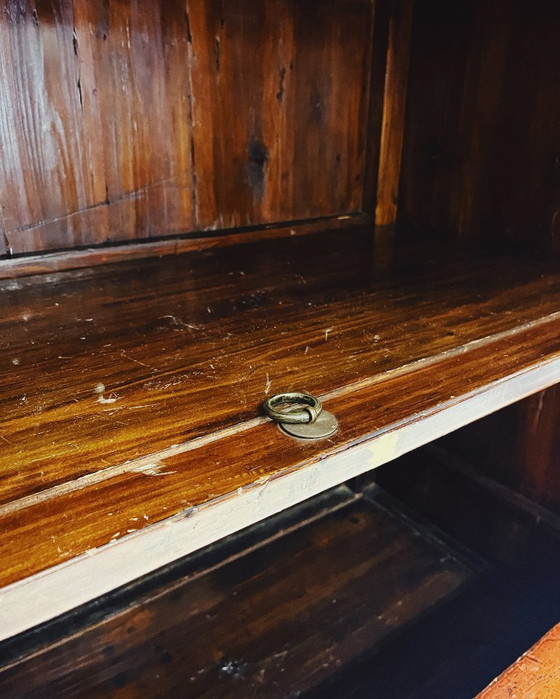 Image 1 of Antique red cabinet with brass details