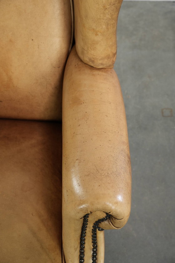 Image 1 of Lichte rundleren oorfauteuil met een goed zitcomfort