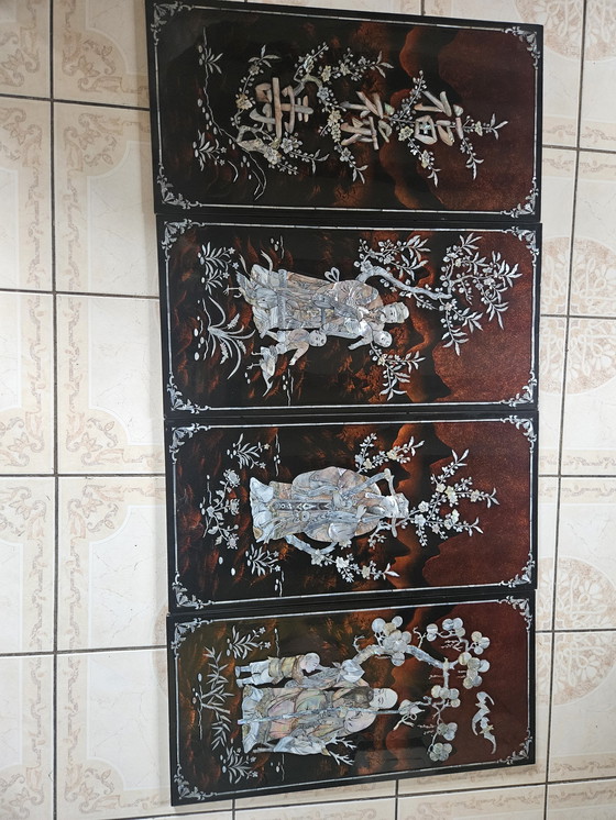 Image 1 of Set of four handcrafted panels in brown lacquer and mother-of-pearl, origin Vietnam, circa 1970