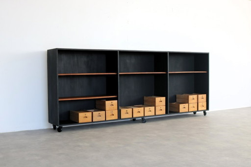 vintage wooden school cabinet with storage bins