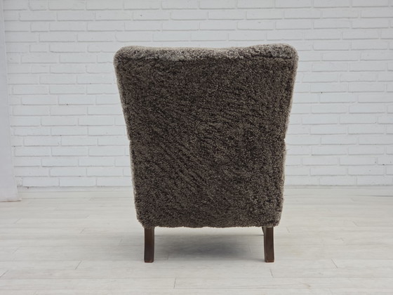 Image 1 of 1960s Reupholstered Danish Armchair in New Zealand Genuine Sheepskin