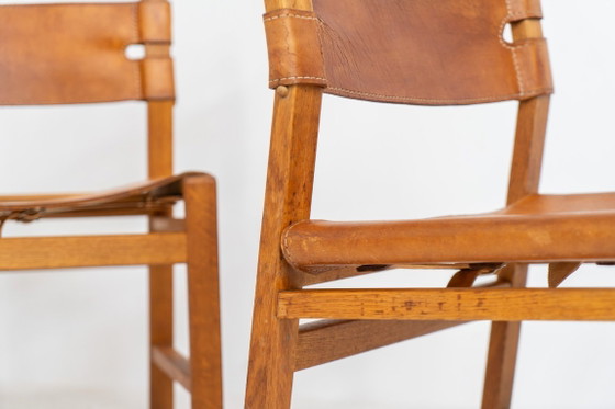 Image 1 of Oak & leather dining chairs (Denmark, 1960s).