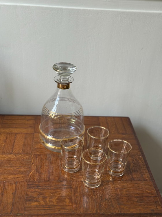 Image 1 of Art Deco style decanter and 8 gold-rimmed liqueur glasses