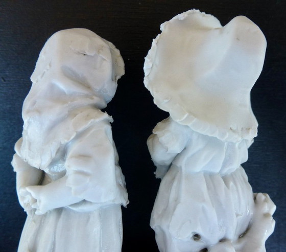 Image 1 of Luxury sponge porcelain figurine with gold leaf finish.