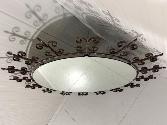 Image 1 of Very large round wrought iron wall mirror 1960's