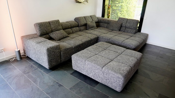 Image 1 of Moderne Grijze Hoekbank met Hocker - Comfortabel en Stijlvol