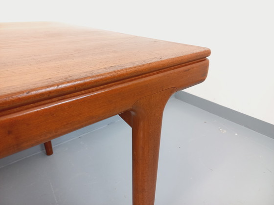 Image 1 of Scandinavian rectangular vintage dining table by Johannes Andersen for Samcom from the 60s in teak with integrated extensions