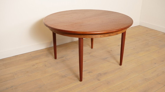 Image 1 of Table de salle à manger ronde vintage | extensible | teck | 130 - 240 cm